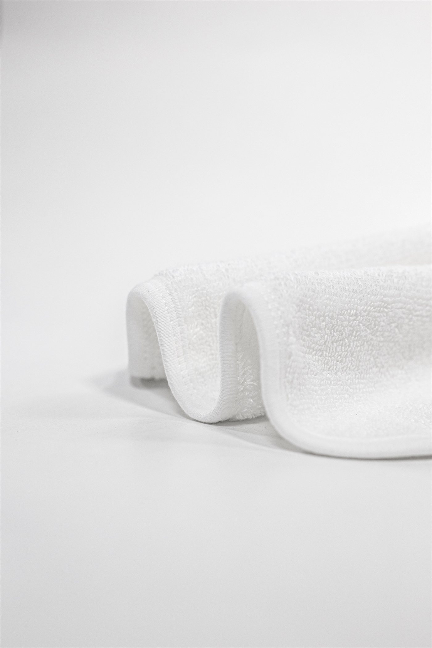 Close-up of plush organic cotton terry loops and stitched hem